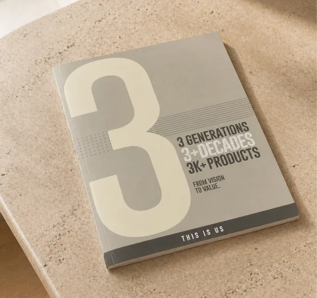 Grey corporate brochure with a large numeral cover