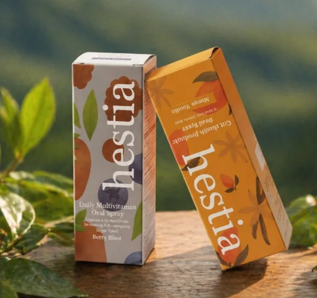 Illustrated supplement cartons on a wooden table