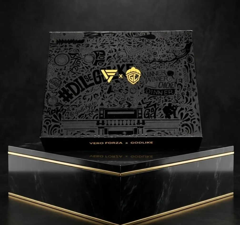 Black magnetic rigid box with tone-on-tone doodle print and gold emblems