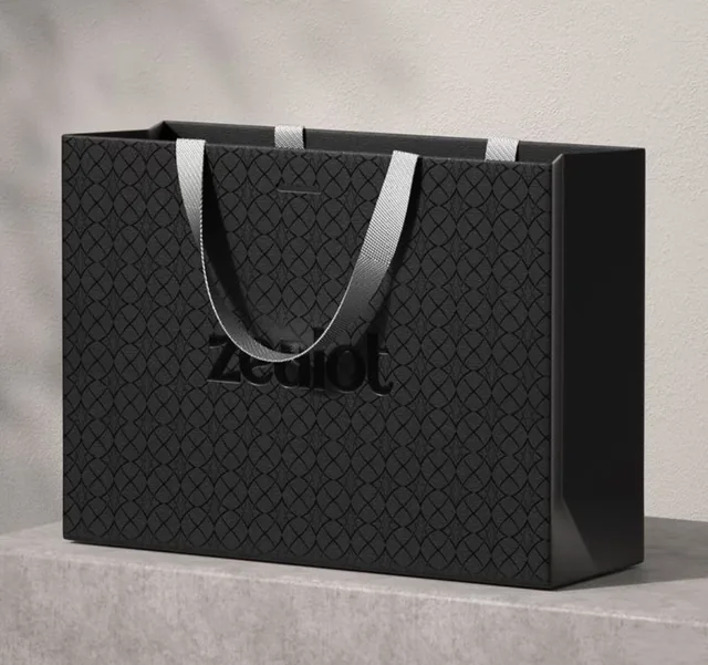 Black euro tote bag with tonal pattern and ribbon handles